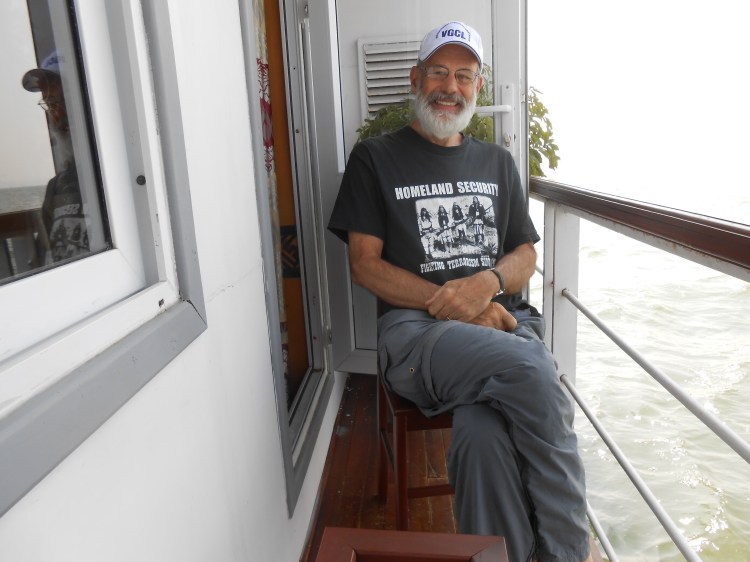 Joe on balcony boat